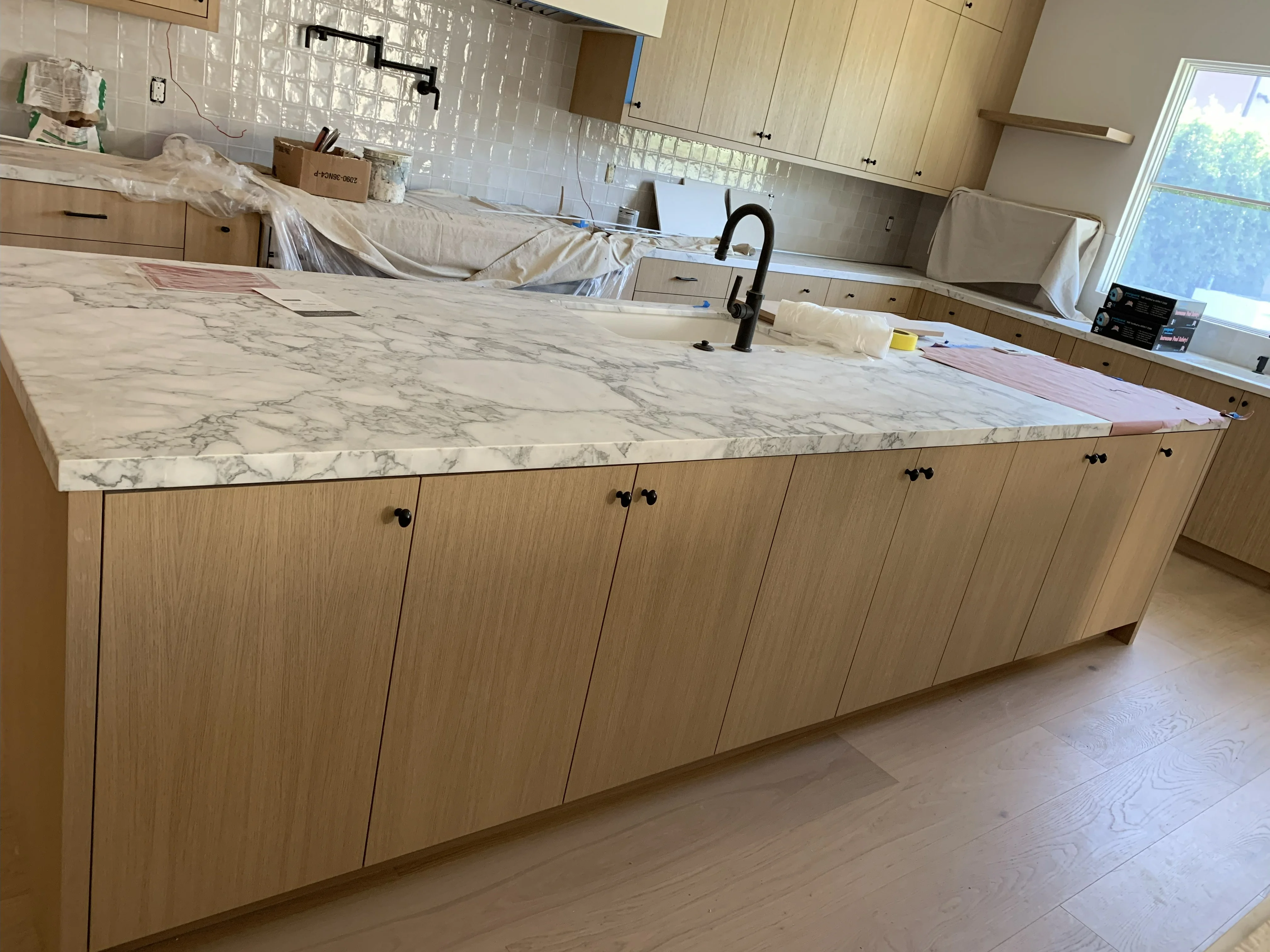 Living room with white oak millwork