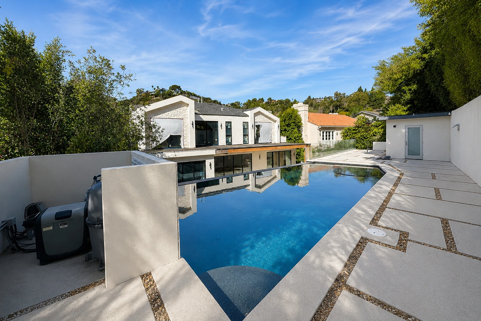 Luxury swimming pool and spa integrated into a landscaped Los Angeles backyard